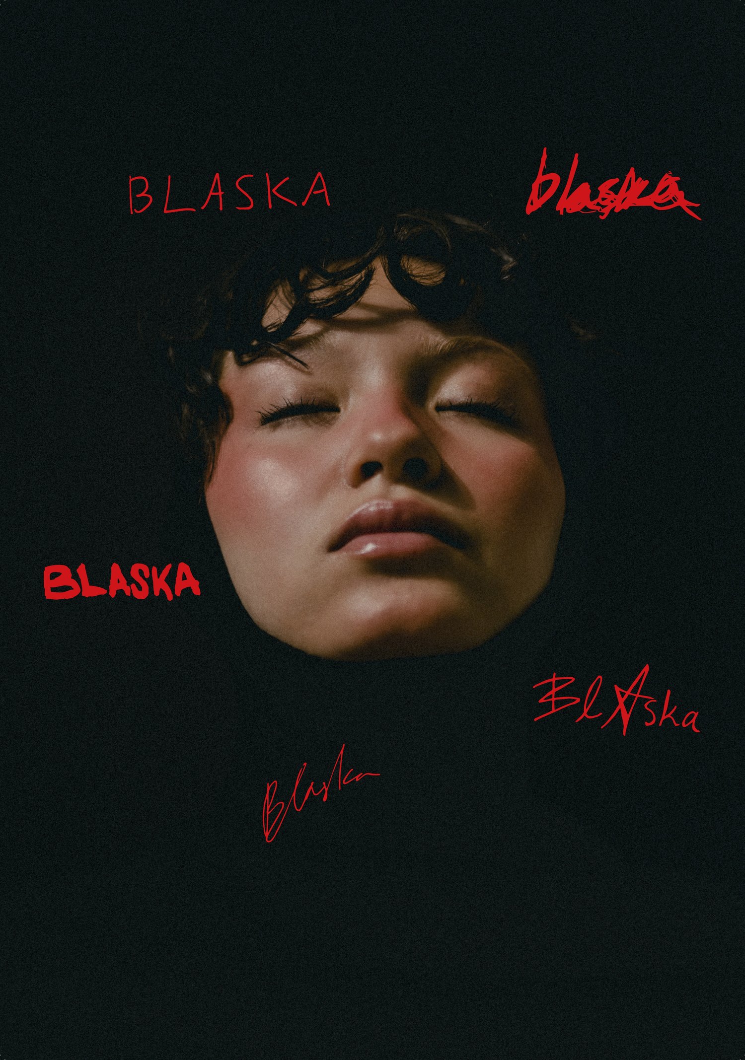 The back cover of Blaska: a face in the dark, surrounded by a few red hand-written BLASKA variants